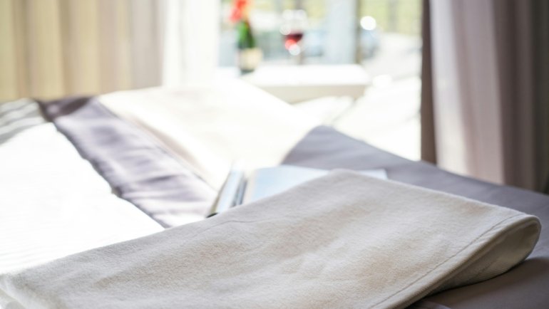 Modern E-Z Trip Travel Center exterior, featuring clean architecture, fuel pumps, and ample parking, symbolizing a safe and convenient road trip rest stop for travelers.