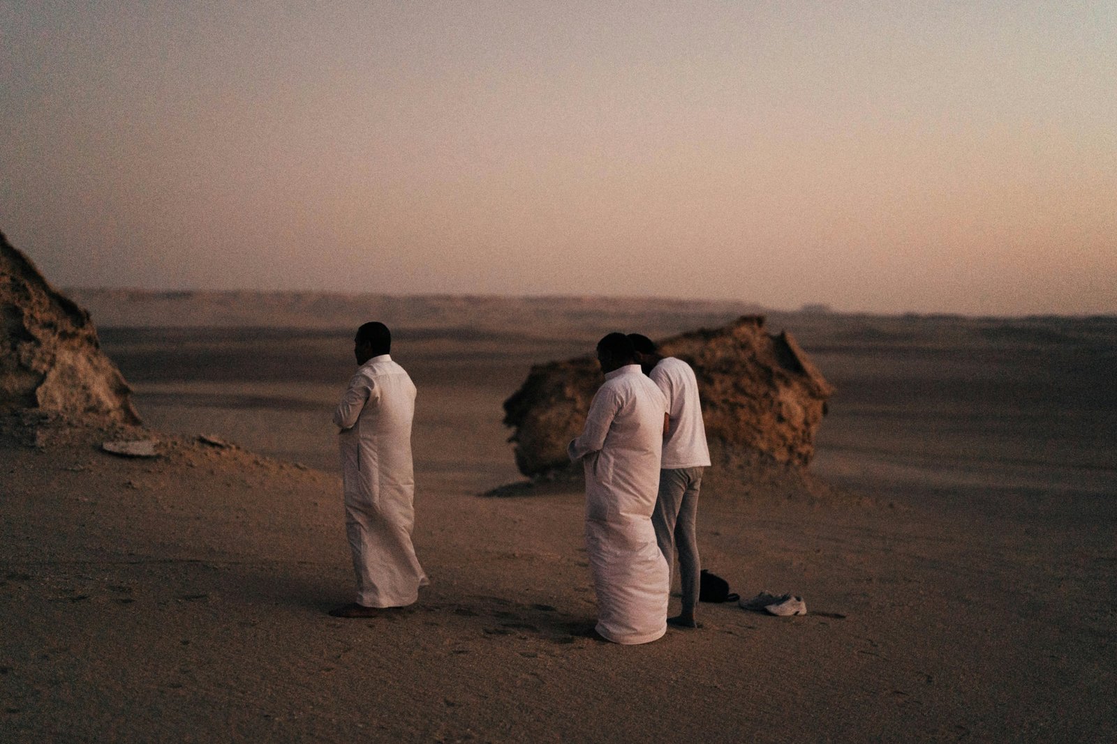 A Muslim traveler offering the Traveling Dua (Dua e Safar) for protection and peace before embarking on their journey, symbolizing spiritual reliance on Allah.