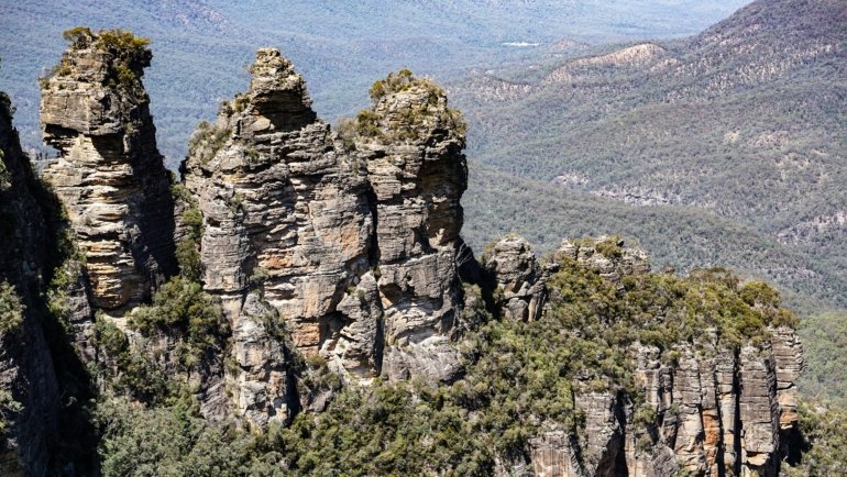 Stunning aerial view of an iconic Australian coastal landscape, illustrating the diverse natural beauty and ideal conditions for a dream trip, perfect for planning travel during any season.