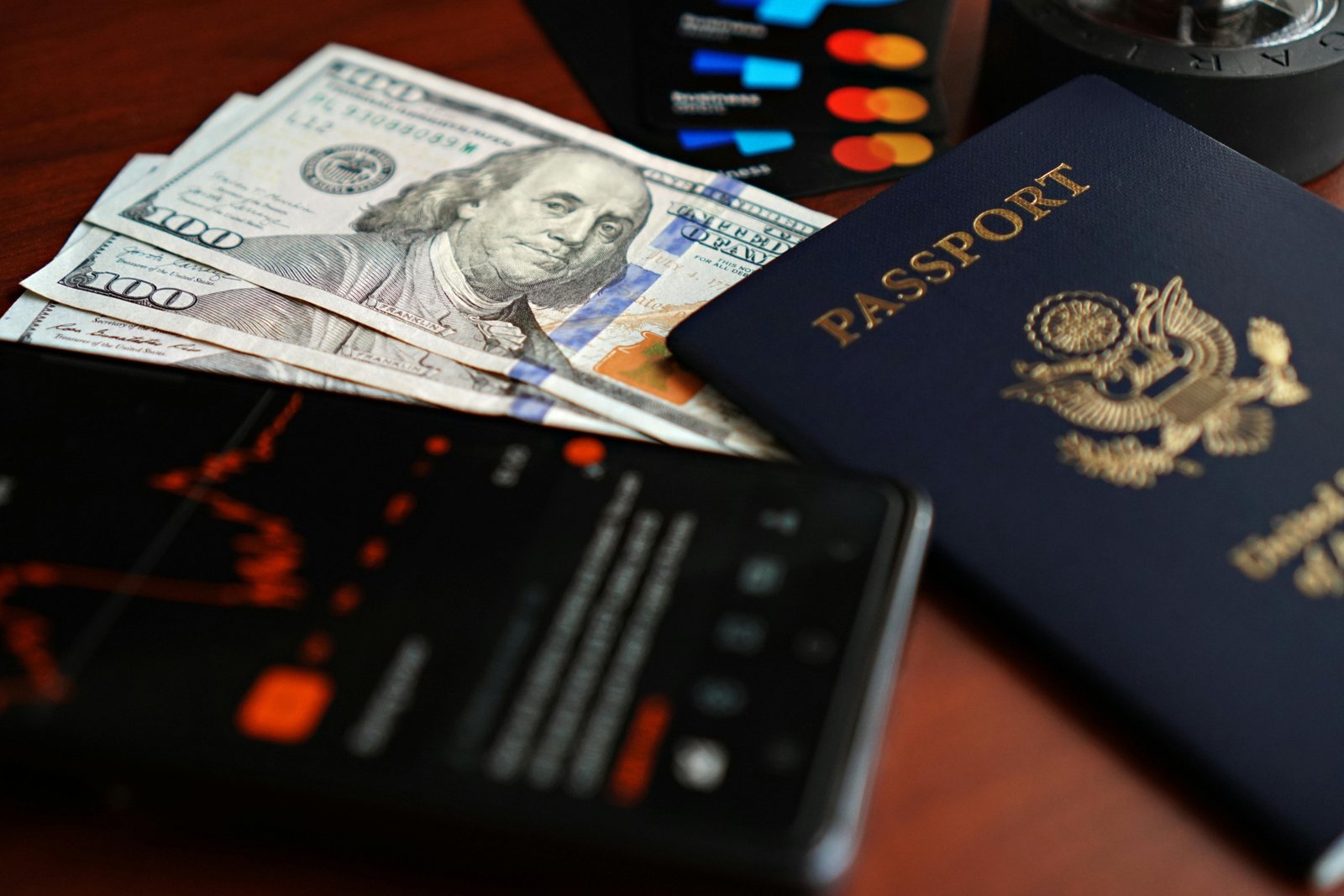 U.S. green card and passport on a world map, symbolizing secure international travel for Lawful Permanent Residents navigating immigration rules and potential travel bans.
