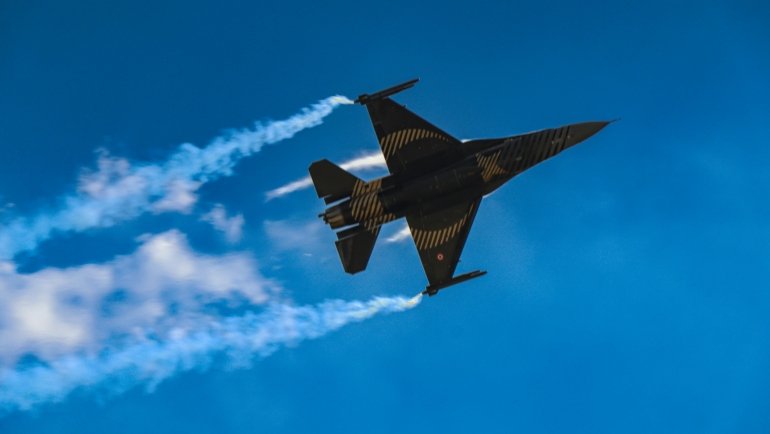 Dynamic image illustrating high-speed bullet velocity and muzzle speed with motion blur, relevant to articles on ballistics and firearm speed.