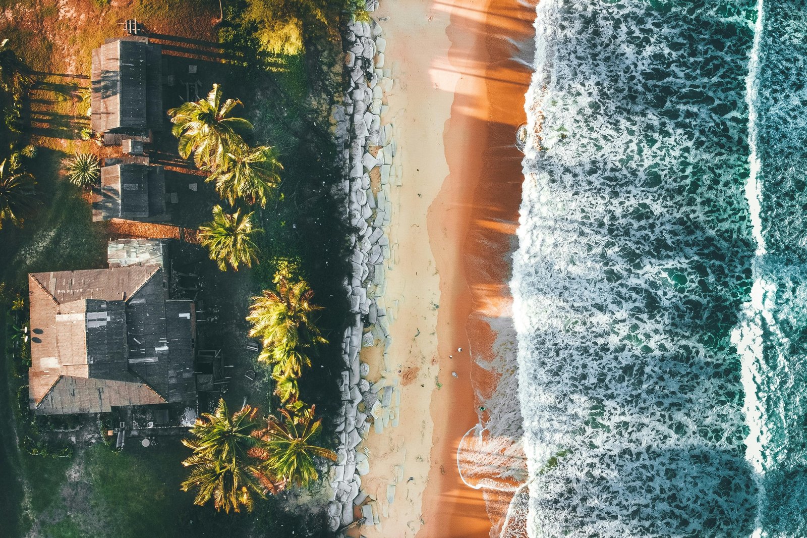 Stunning panoramic view of Malaysia's diverse beauty, featuring a sunny tropical beach, lush green rainforest, and a modern city skyline, illustrating the best time to travel to Malaysia for an ideal holiday.