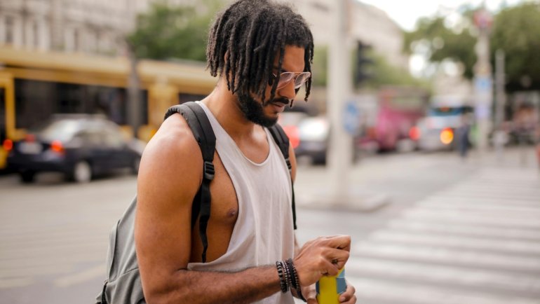 Samsonite travel backpack on a savvy globetrotter, showcasing durable design, smart organization, and ergonomic comfort for modern journeys.