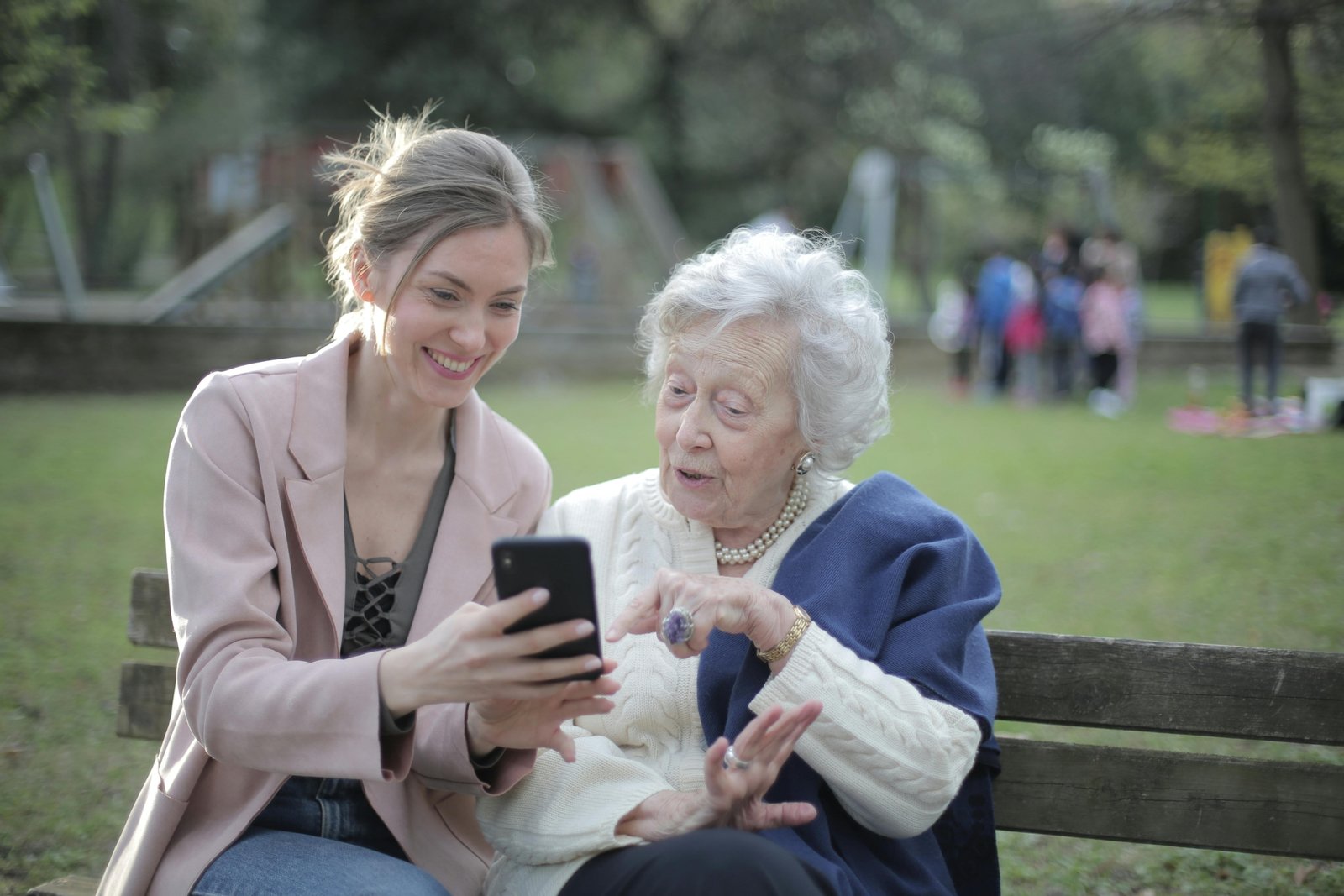 Smiling person using a laptop to apply a Halfday Travel discount code, successfully booking an affordable half-day trip online and saving money.