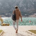 Man wearing versatile men's travel pants, ideal for urban exploration and outdoor adventure, offering comfort, durability, and style.