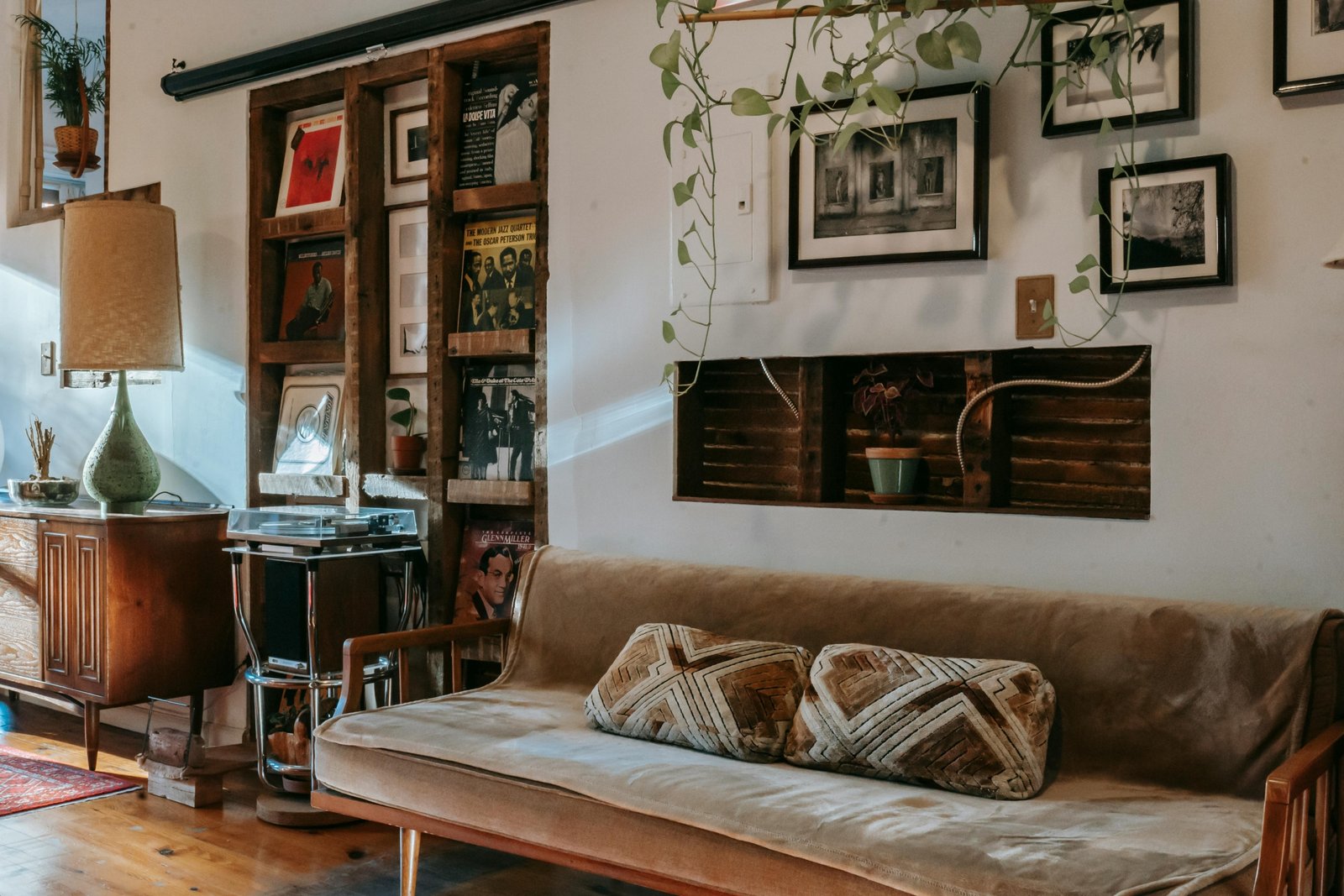 Vintage steamer travel trunk used as a coffee table in a stylish living room, showcasing its antique charm, leather details, and modern home decor versatility.