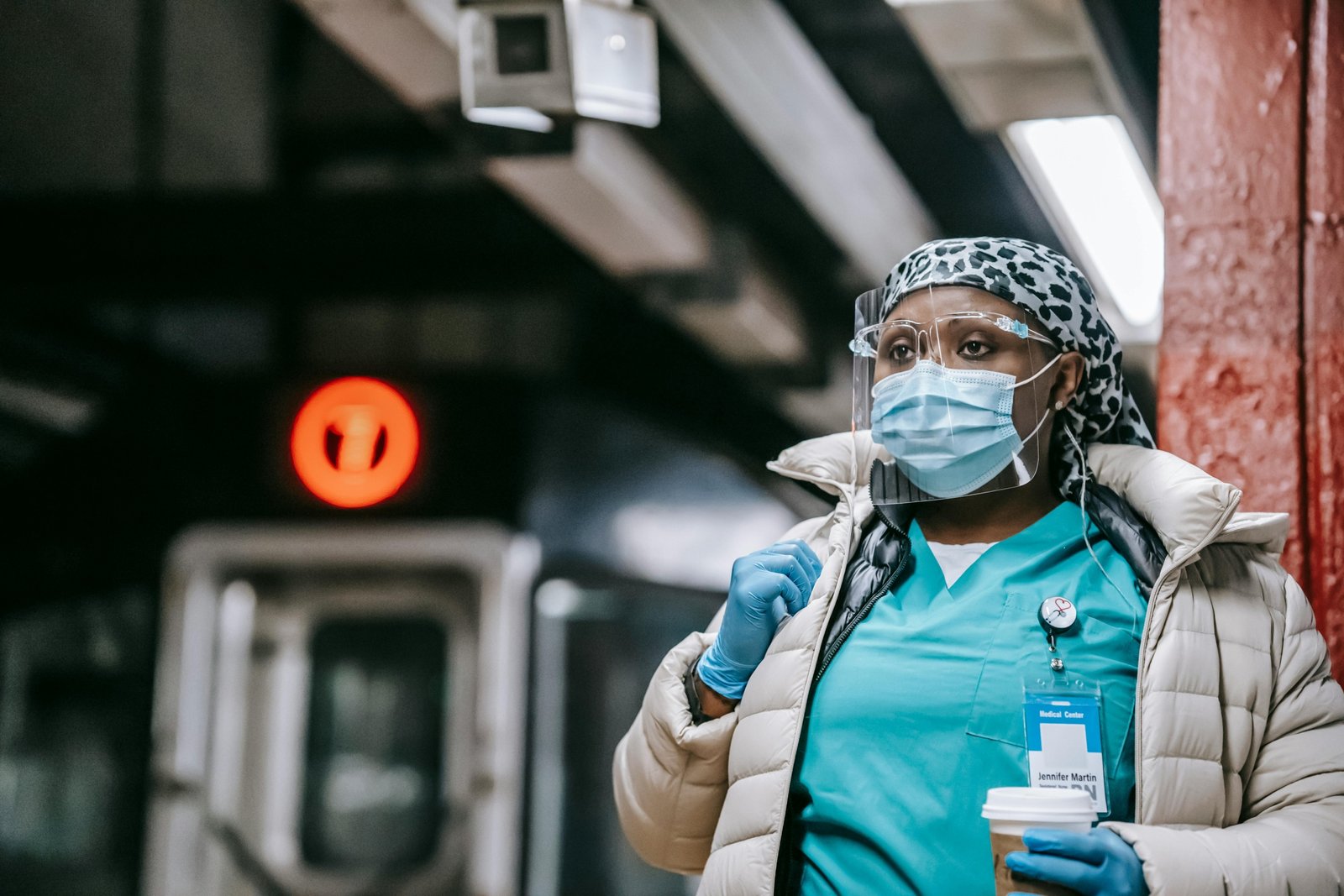 Confident traveling phlebotomist in scrubs with medical bag, representing dynamic healthcare career and high travel phlebotomist salary potential.