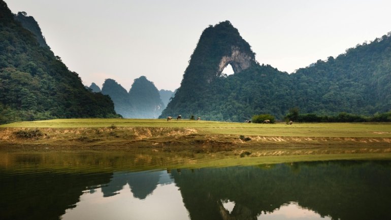 Scenic landscape of Vietnam with clear skies, representing ideal travel conditions for exploring its diverse regions and planning the best time for your trip.