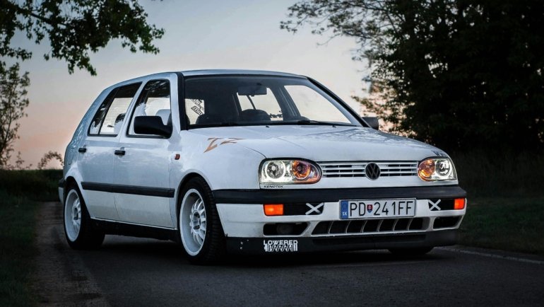 Travelers Inn Motel exterior with car at dusk, representing affordable and convenient accommodation for road trippers and families.