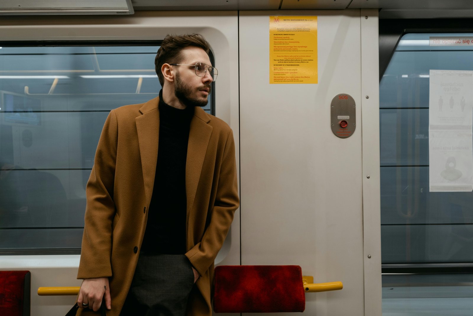 A confident man wearing a versatile men's travel vest with multiple pockets, exploring an urban setting, symbolizing organized and secure travel.