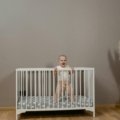 Travel crib for baby ensuring safe, comfortable sleep for infants on family adventures.