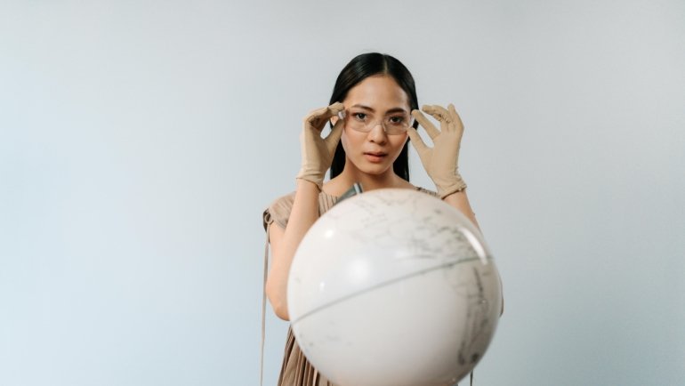 A confident radiologic technologist looking towards a city skyline, symbolizing the exciting career path of travel rad tech jobs, professional growth, and exploring new places in healthcare.