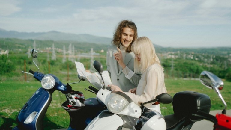 Two young protagonists walking a rural road, symbolizing the coming-of-age journey in the independent film Have Dreams, Will Travel.