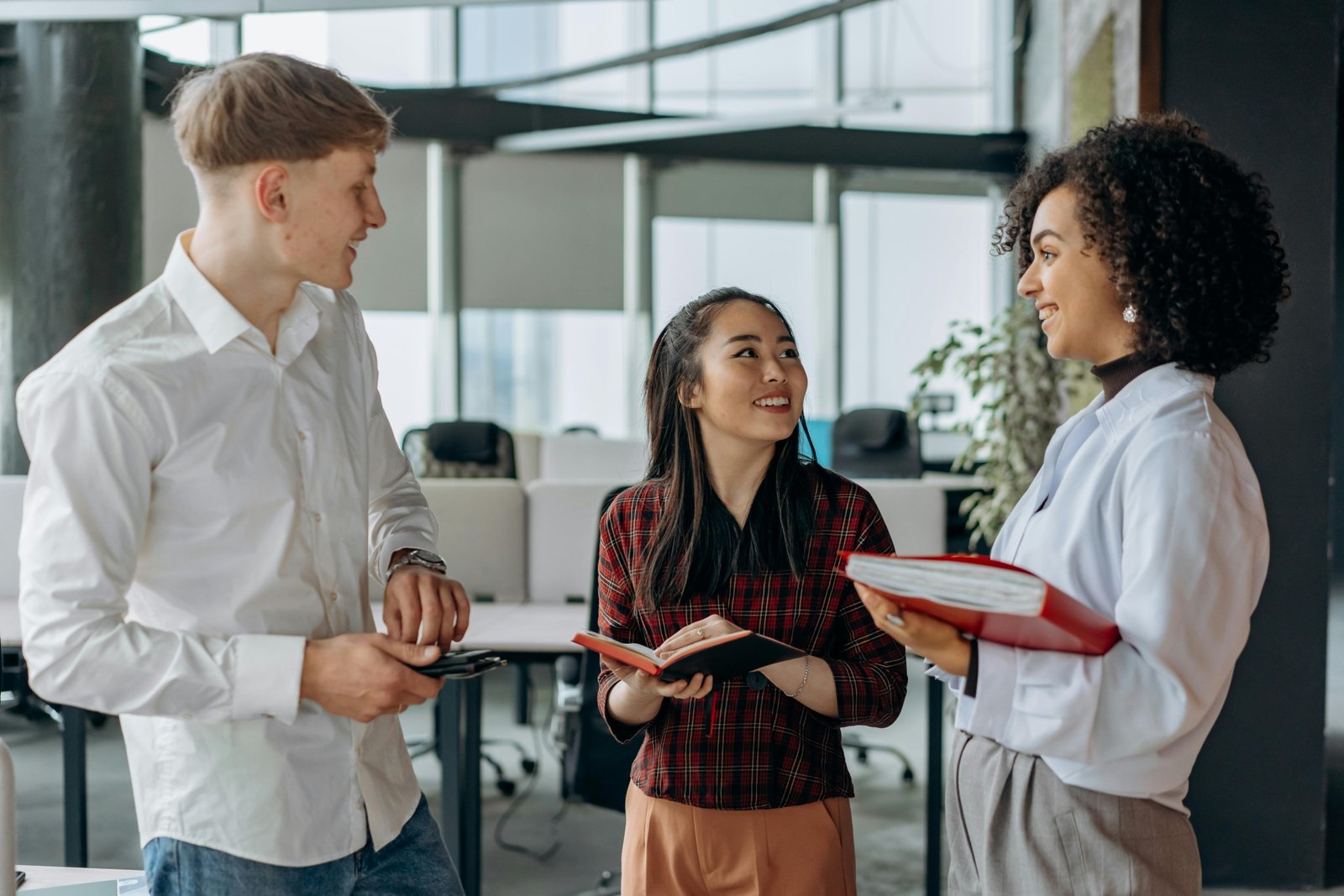 Diverse employees smiling, representing Love's Travel Stop careers, job opportunities, and professional growth within a supportive team environment.
