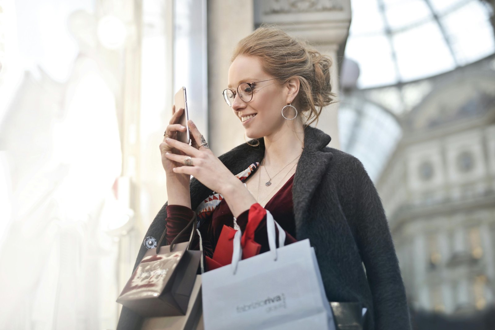 Stylish woman with a secure anti-theft crossbody travel purse exploring a European city street, perfect for safe and comfortable travel in Europe.