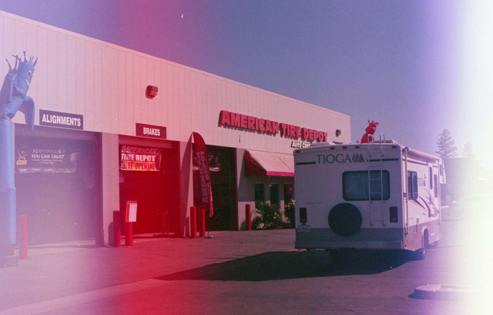 Hands replacing a part on an RV toilet in a travel trailer, illustrating DIY repair of common travel trailer toilet problems like leaks or running water using replacement parts.