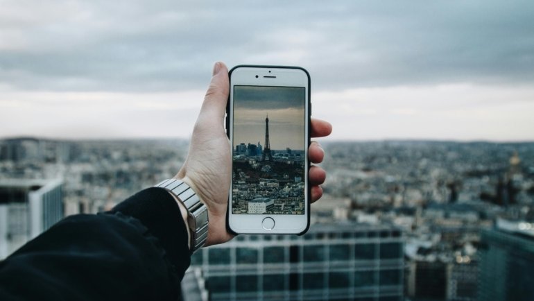 London to Paris travel guide featuring different transportation options: Eurostar train, plane, and bus, connecting iconic cityscapes for a memorable European journey.