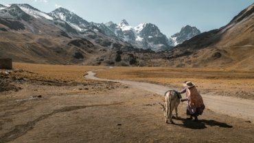 Vibrant image showcasing affordable South America travel, featuring diverse landscapes like mountains or ancient ruins and rich local culture, perfect for budget adventurers and backpackers exploring the continent.