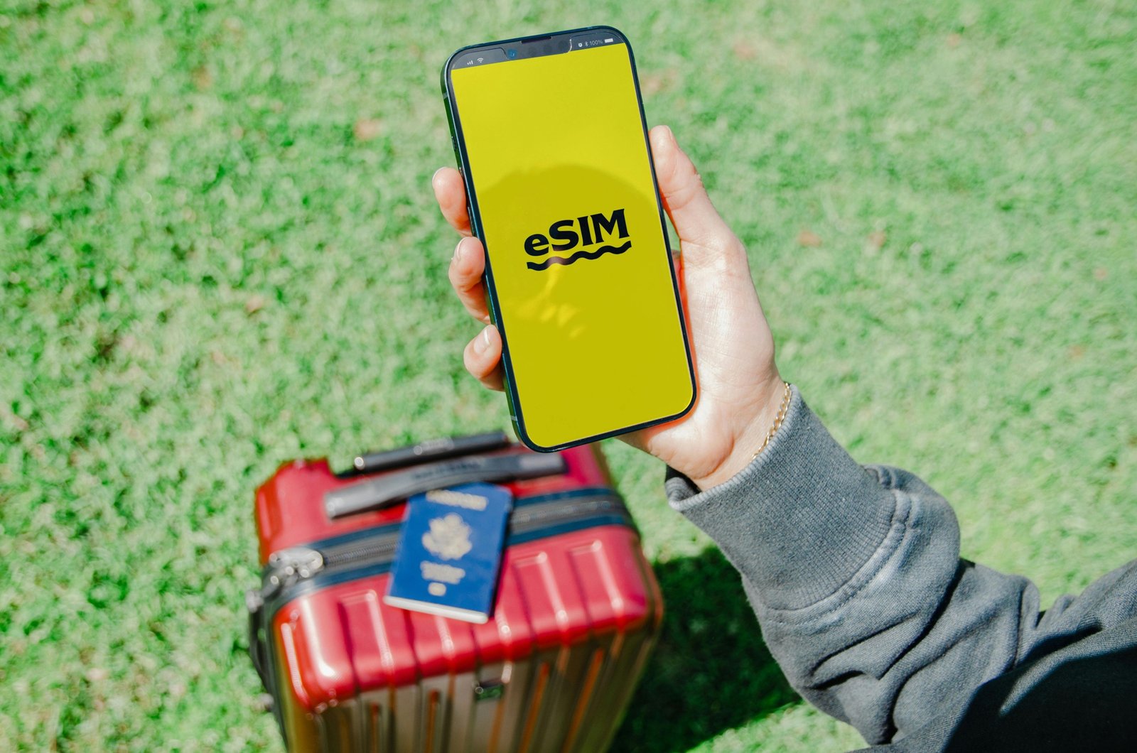 Happy traveler using smartphone in an exciting foreign city, symbolizing seamless global connectivity with a reliable travel contact solution like an eSIM or international SIM card.