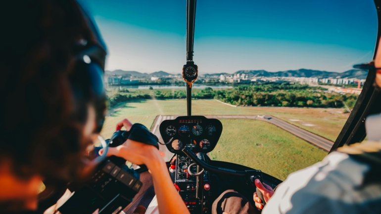 Phlebotomy travel jobs: Confident healthcare professional exploring a new city, symbolizing career adventure, professional growth, and flexibility.