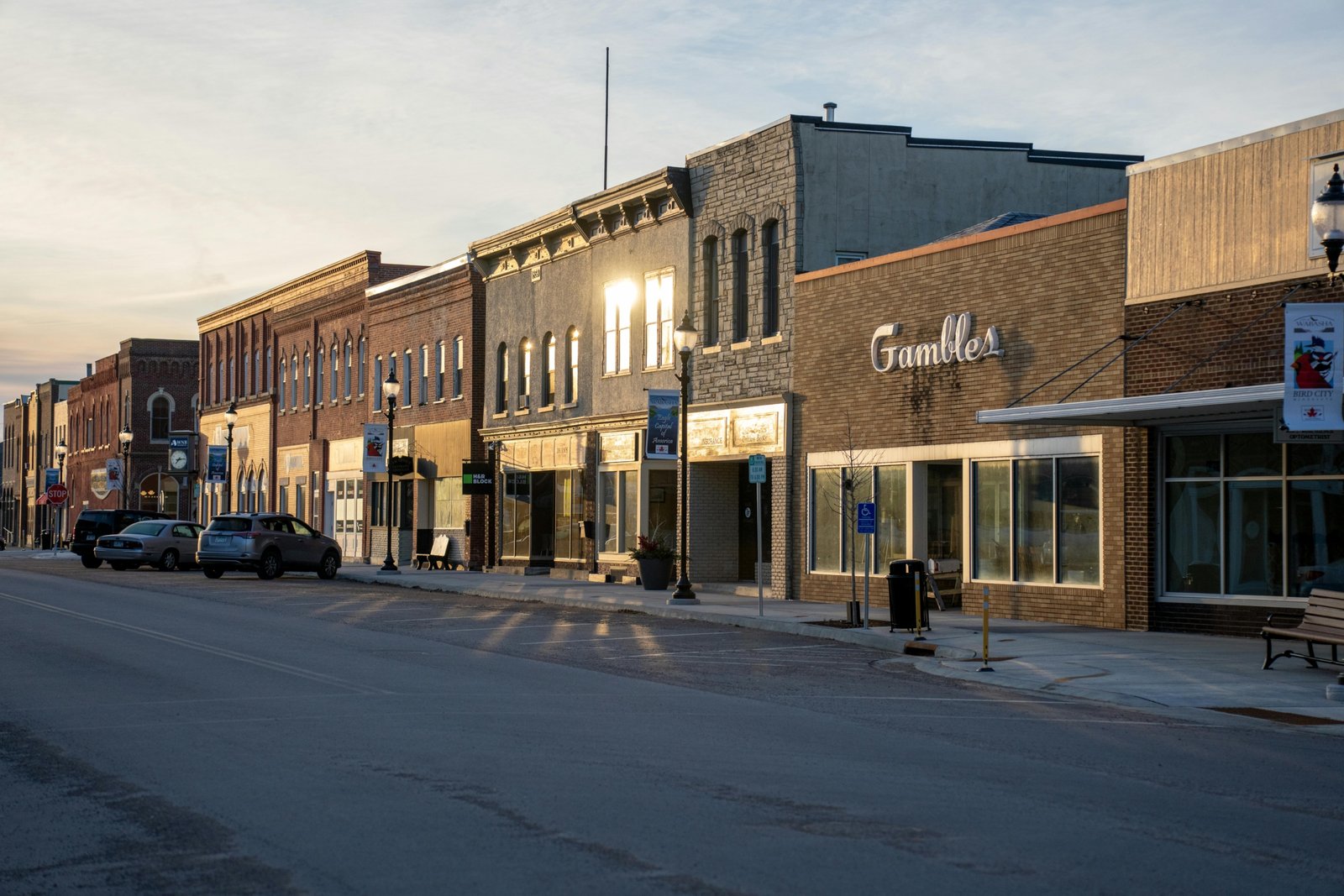 A picturesque main street in a charming small town, featuring local boutiques, cafes, and a relaxed atmosphere, perfect for authentic main street travel experiences.