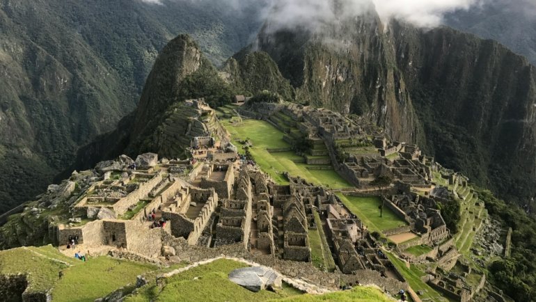 An inspiring image showcasing the diverse beauty of South America, featuring iconic landmarks, breathtaking natural scenery, and vibrant cultural elements, promoting unforgettable travel experiences.