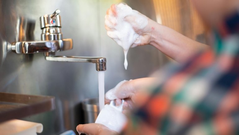 Effective hygiene and safe food/water practices preventing microscopic parasite transmission, specifically Microsporidia, and ensuring public health.