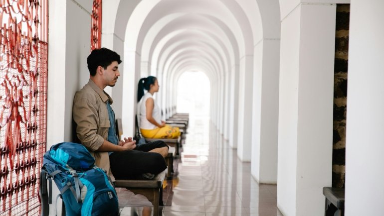 Happy diverse travelers enjoying their trip with peace of mind, confident in their Tin Leg travel insurance coverage for a worry-free journey.