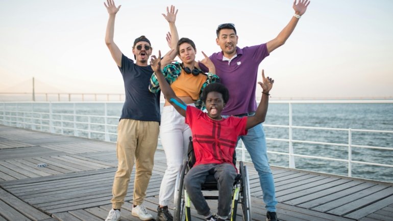 Group of women friends on a sisterhood travel adventure, laughing and exploring a beautiful destination, symbolizing connection, empowerment, and shared discovery.