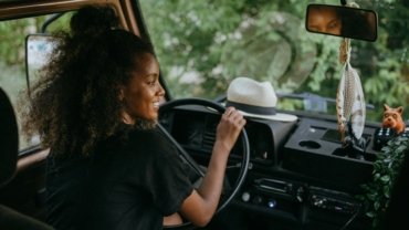 Dodge travel van (like a Ram ProMaster) in a beautiful natural setting, ready for an exciting van life adventure and custom conversion.