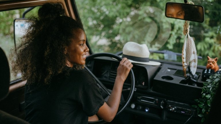 Dodge travel van (like a Ram ProMaster) in a beautiful natural setting, ready for an exciting van life adventure and custom conversion.