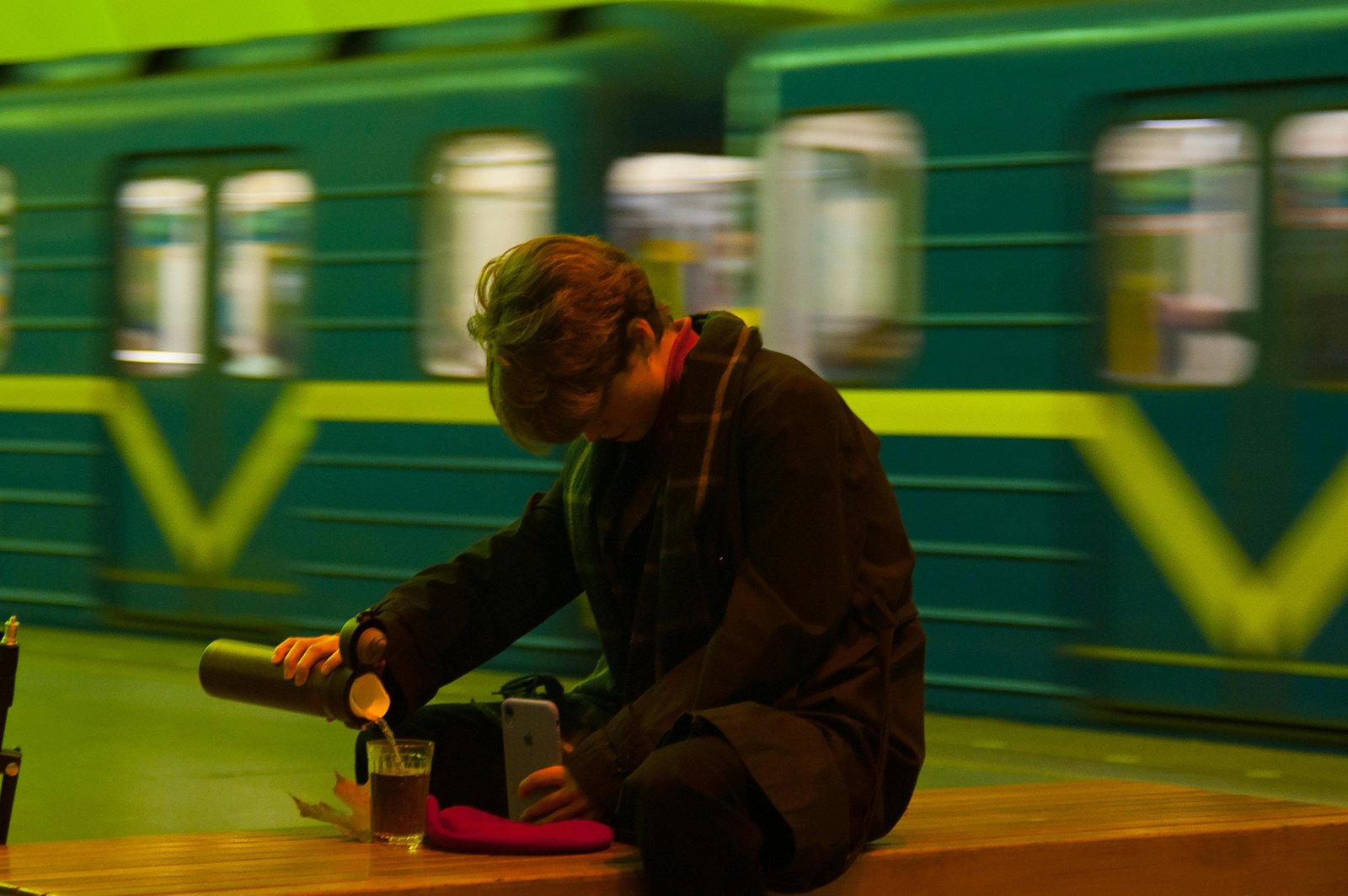 Personalized custom travel mug held by a person, ideal for daily commutes and expressing unique style with its durable, insulated design.