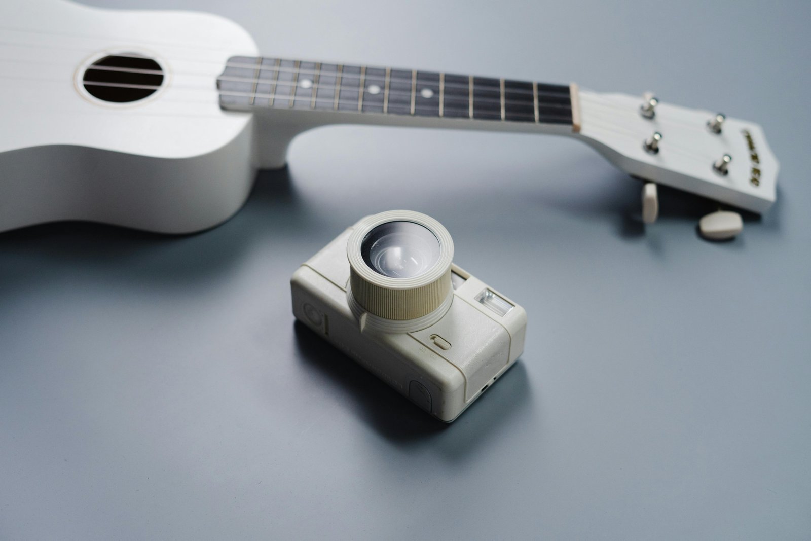 Close-up of an acoustic guitar with subtle visual effects suggesting vibration or sound waves, illustrating how technology like the Tone Traveler enhances wood for a richer, vintage tone and superior musical performance.