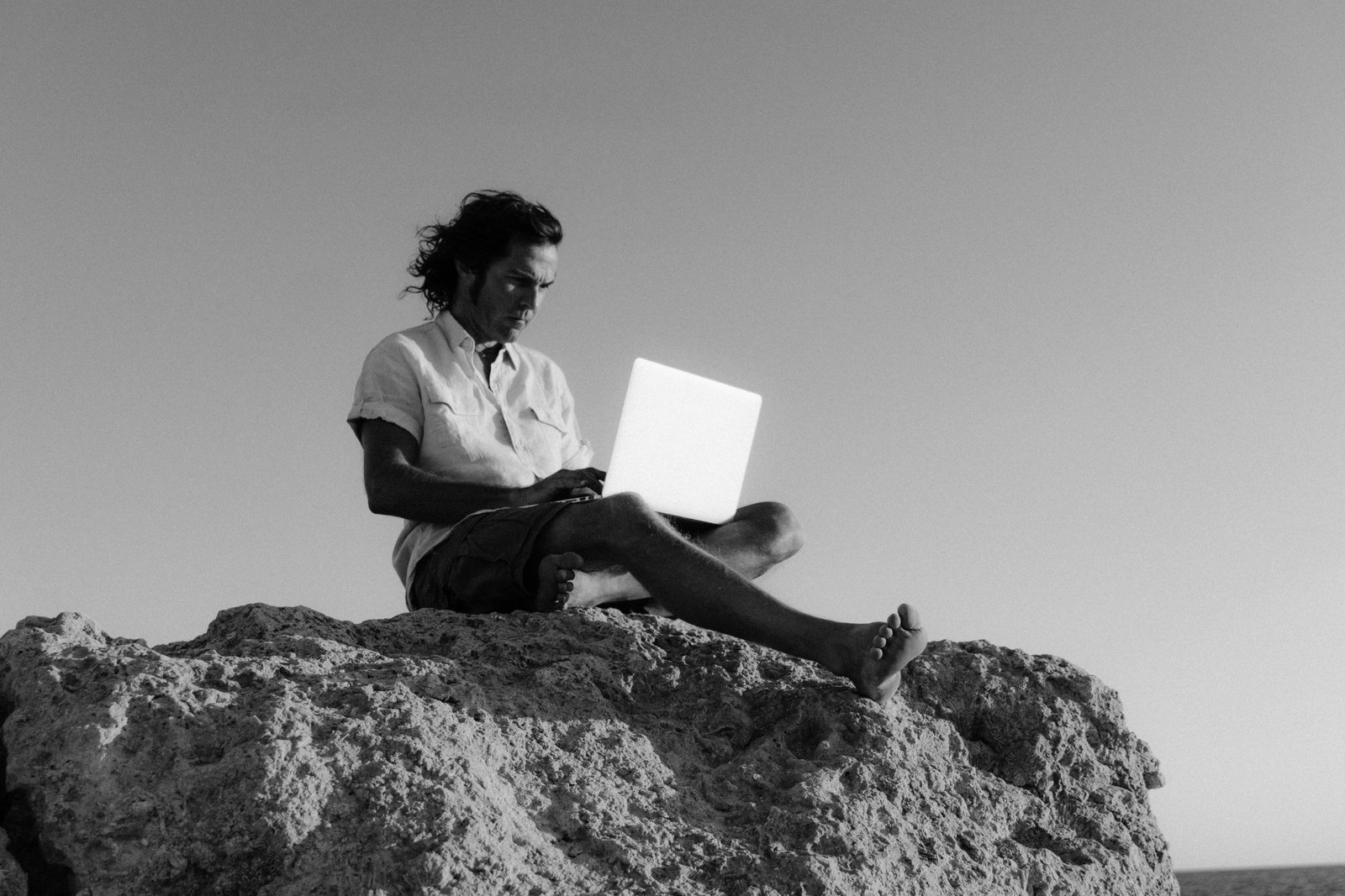 A smiling travel pharmacist standing against a scenic backdrop, embodying career adventure, professional growth, and the flexibility of working in diverse healthcare locations.