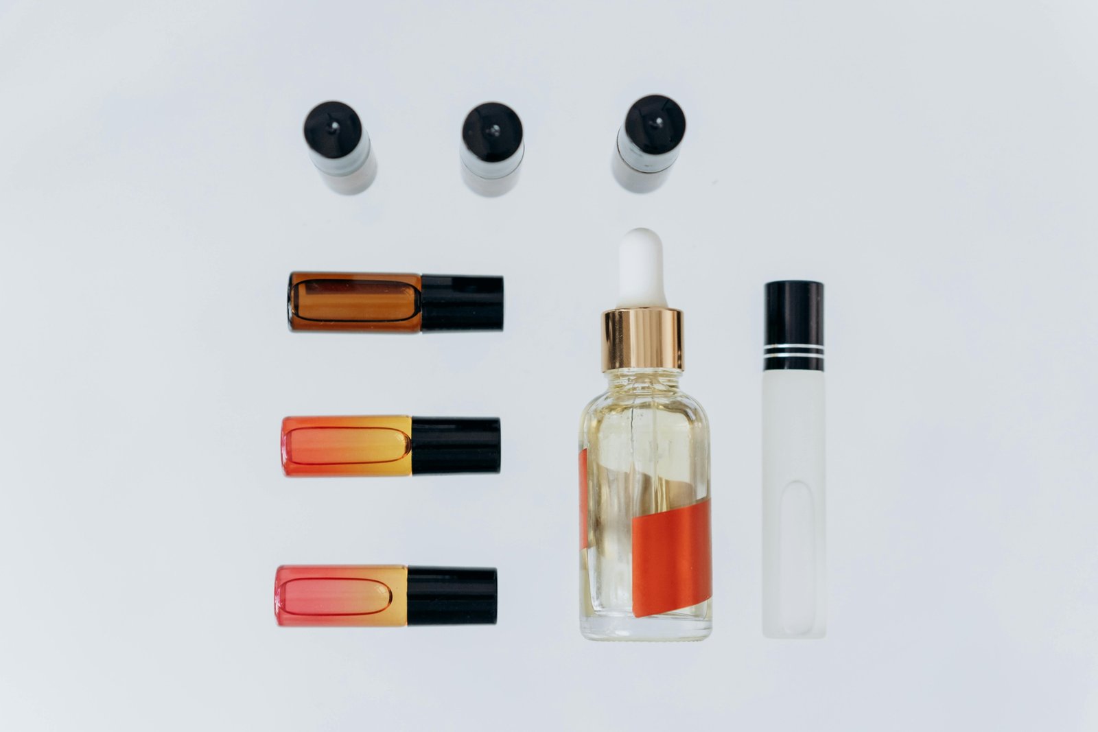 Flat lay of diverse TSA-compliant travel mouthwash options (liquid, tablets, concentrate) and other compact oral hygiene essentials, neatly packed for smart carry-on, ensuring fresh breath and confident travel.
