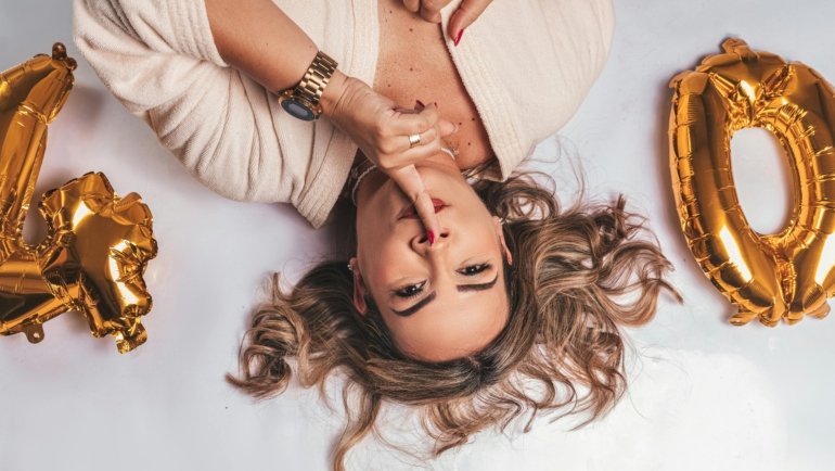 People celebrating 40th birthday during travel with scenic landscape and joyful atmosphere