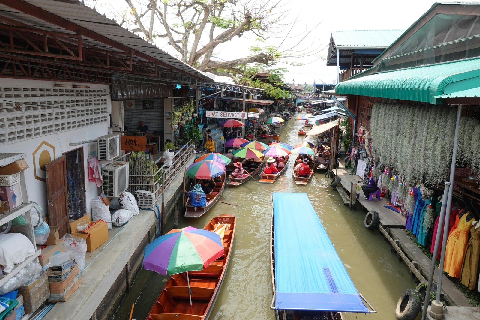 Collage of Thailand travel highlights featuring Bangkok markets, Chiang Mai temples, Phuket beaches, and Ayutthaya ruins