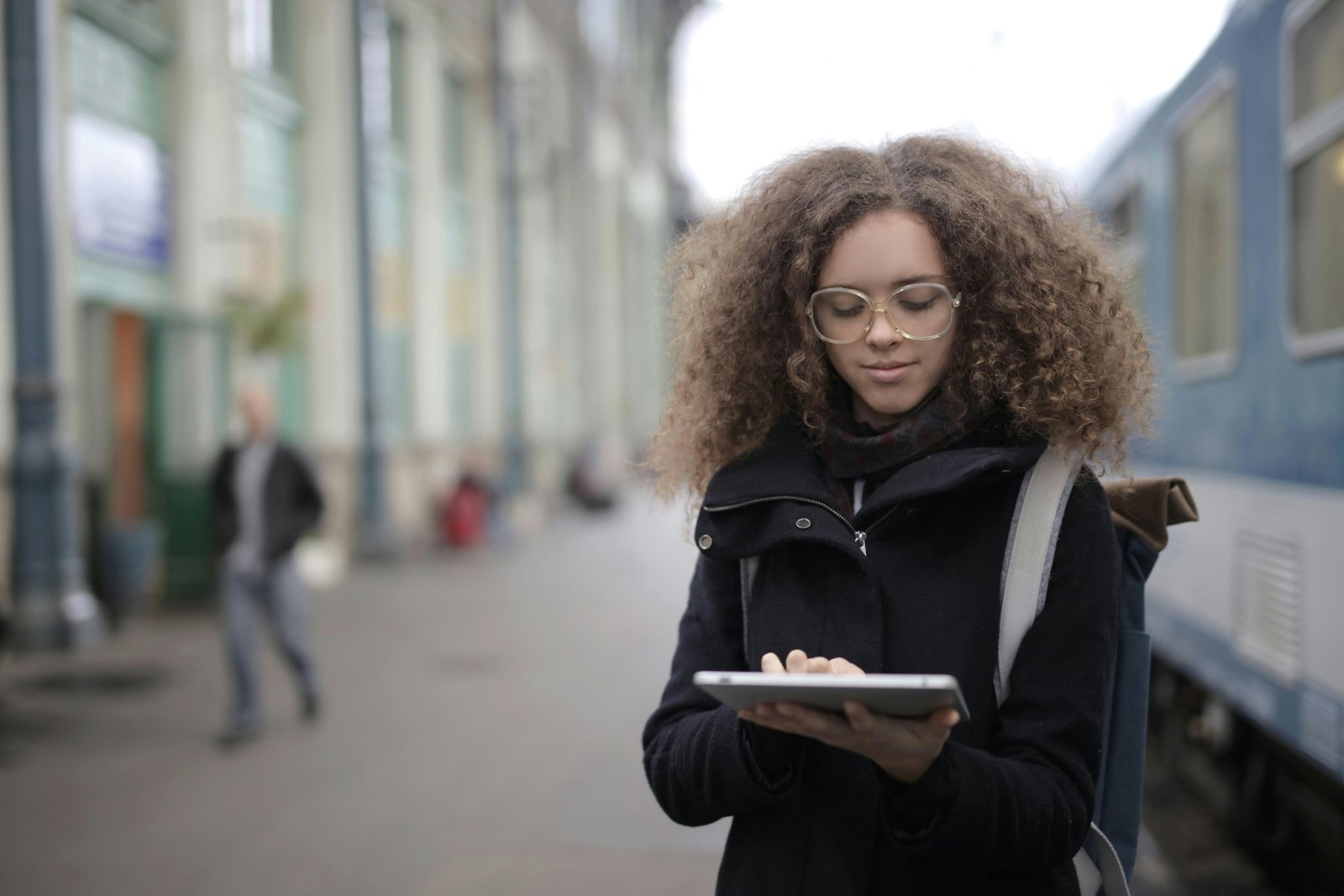 Student with disability confidently using public transportation with travel training materials in Philadelphia