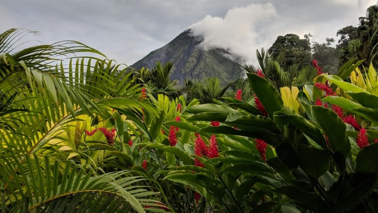 Scenic tropical beach with volcano and rainforest in Central America highlighting nature and travel adventure