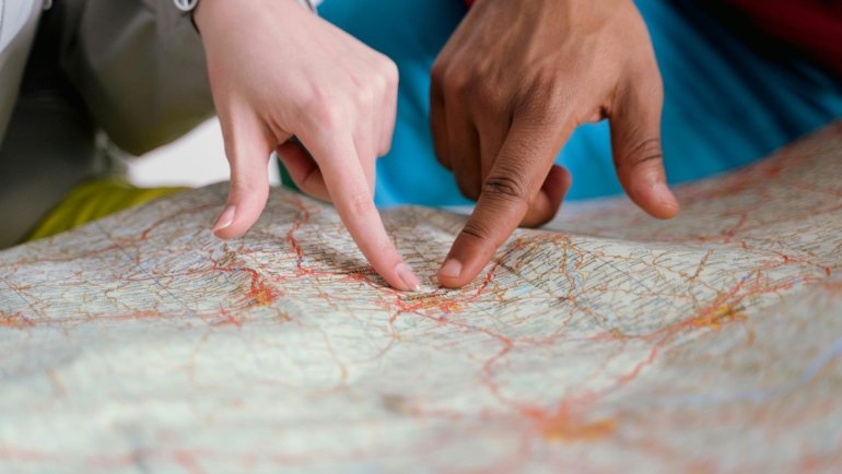 Travel assistant helping client plan a stress-free trip with digital tools and personalized service