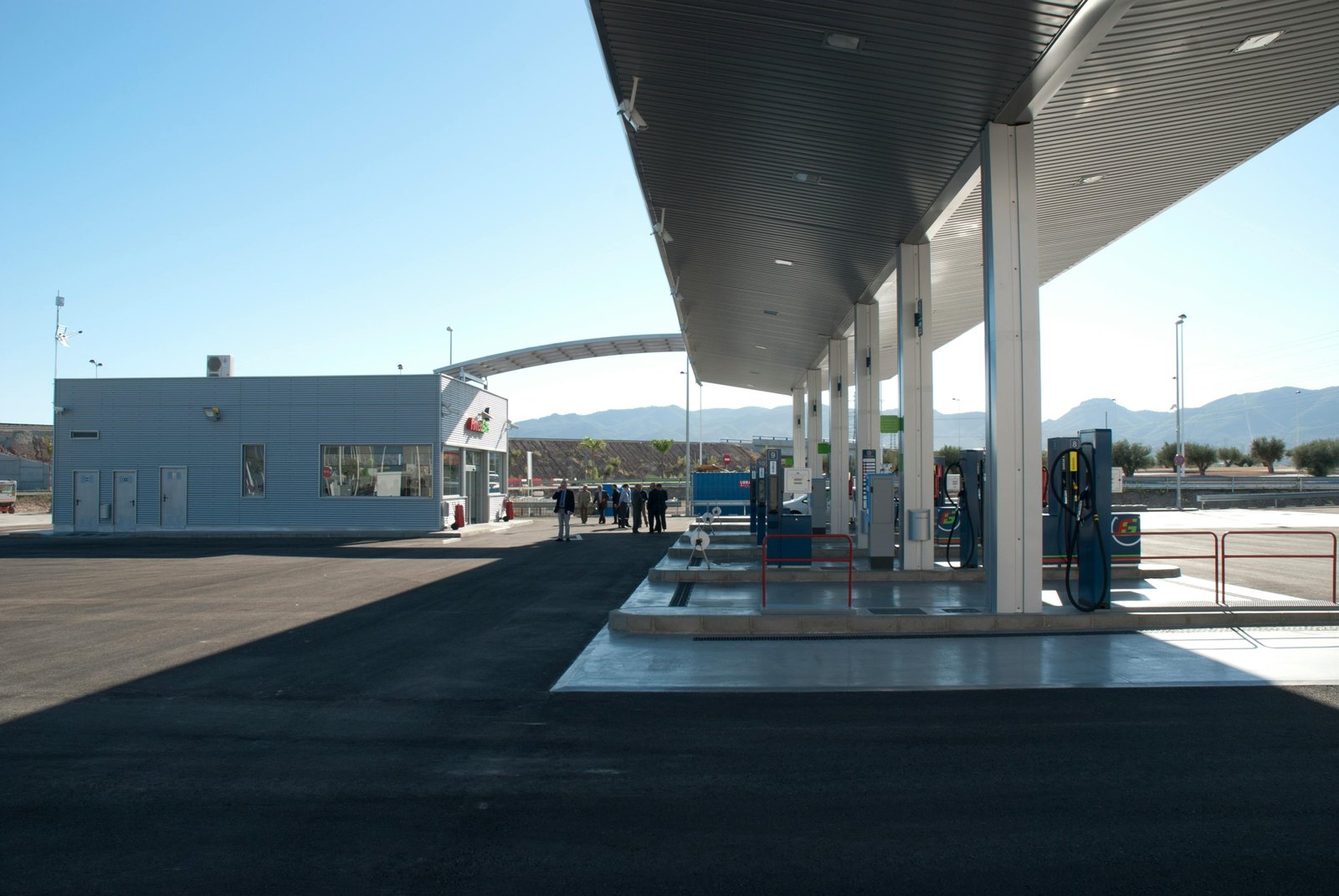Pilot dealer town pump travel center with fuel pumps, convenience store, and rest area for road travelers