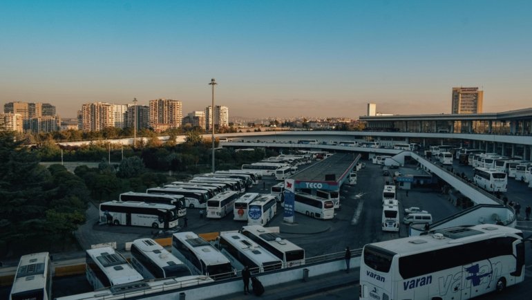 Various intercity travel options including train, bus, airplane, and car illustrating transportation choices for long-distance journeys