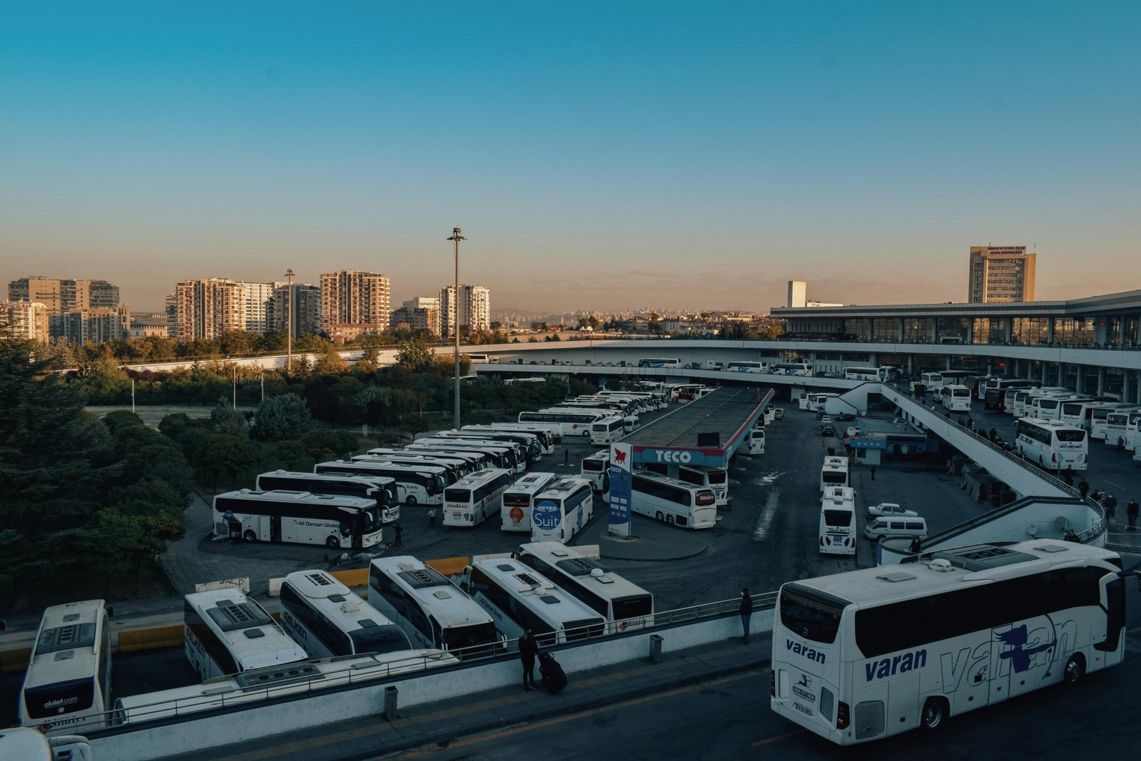 Various intercity travel options including train, bus, airplane, and car illustrating transportation choices for long-distance journeys