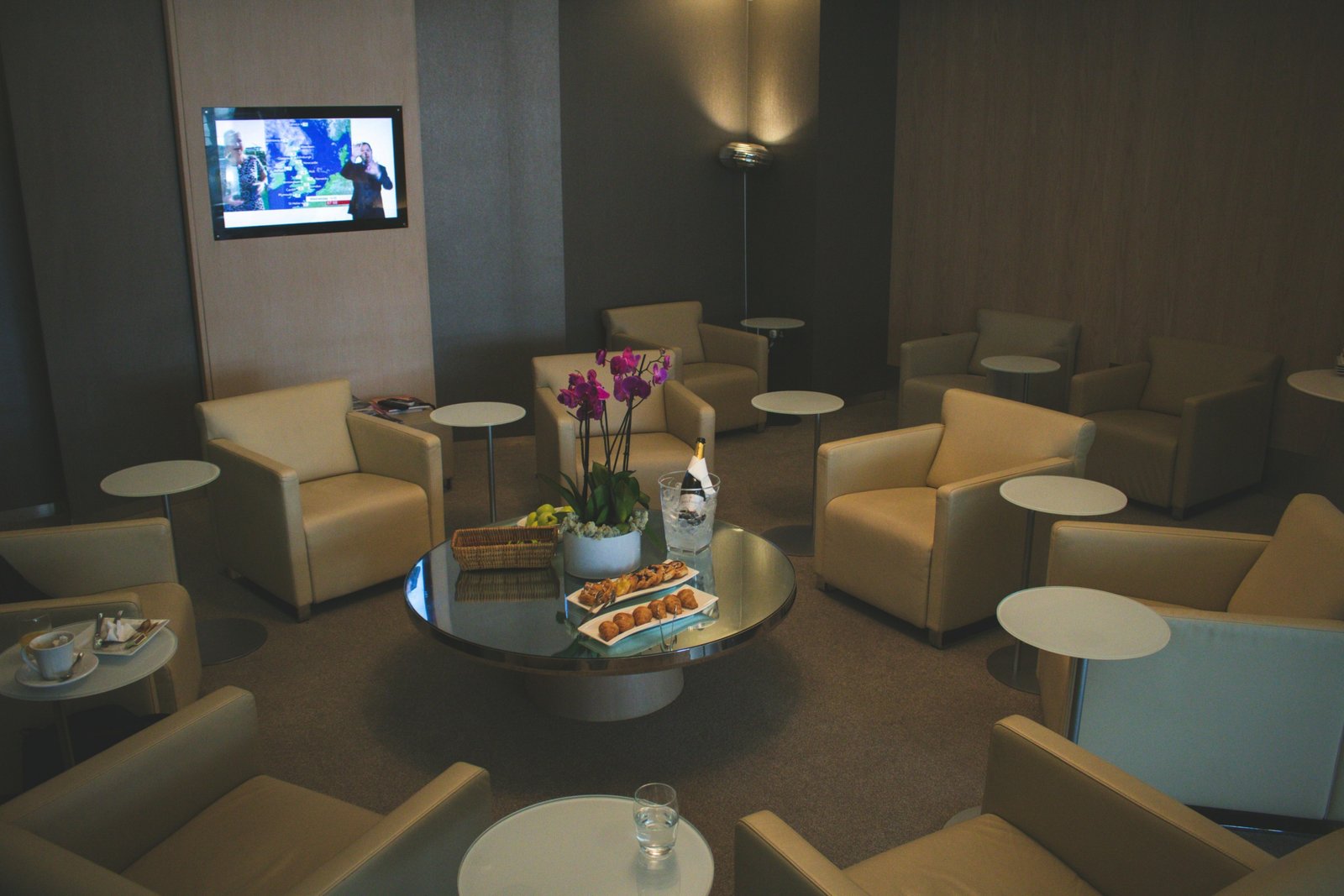 Elite traveler relaxing in a luxury airport lounge with exclusive amenities and priority services