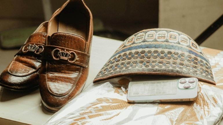 Premium leather penny loafers on feet showcasing classic style and durability