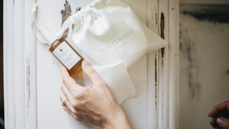 Compact travel skincare bag with Panoxyl travel size acne treatment for clear skin on the go