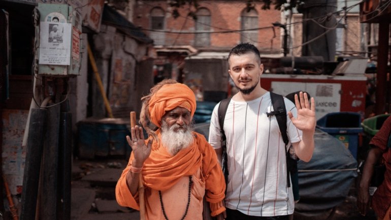 mindful traveler connecting with local culture during intentional travel experience