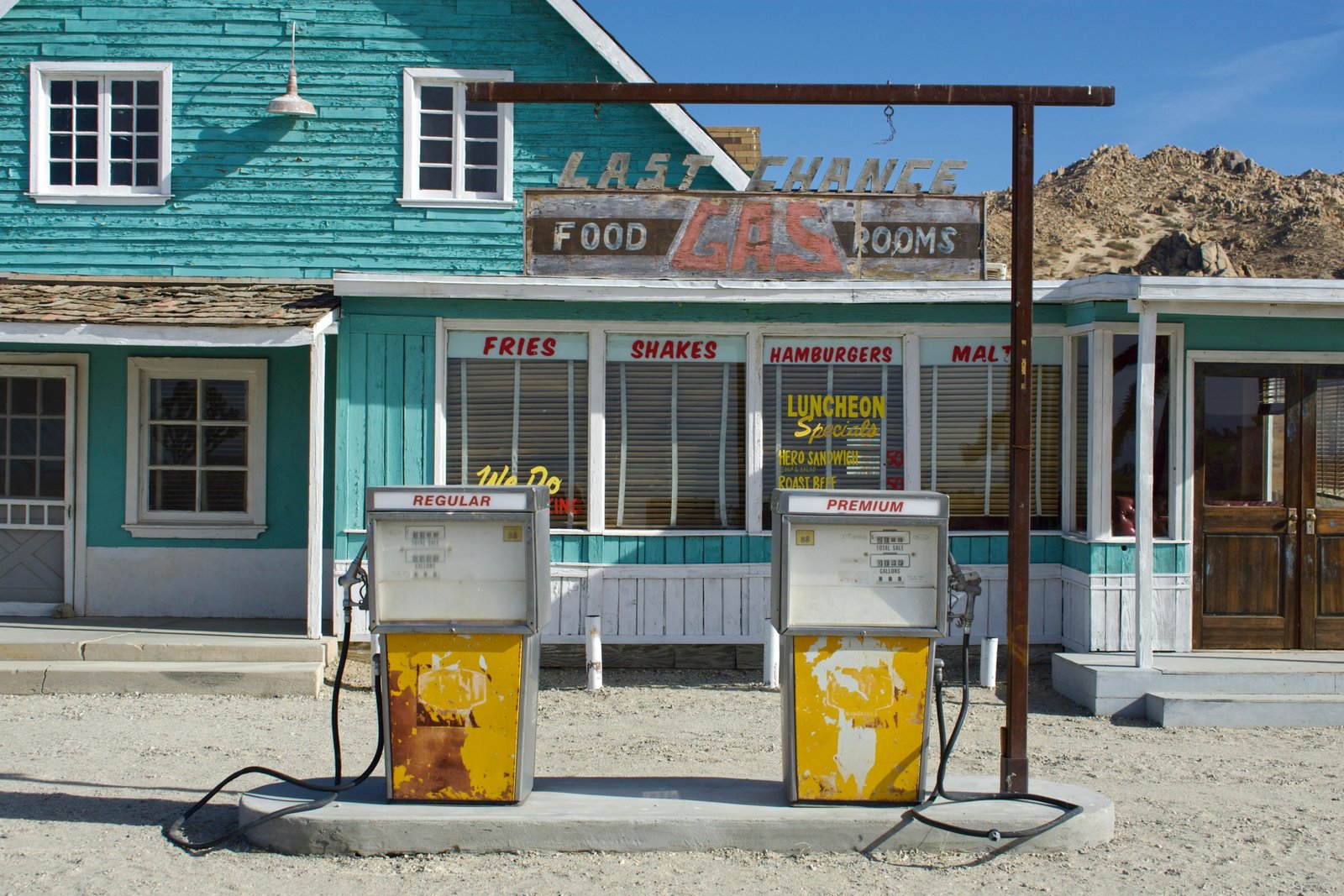 RT 66 Travel Center with fuel pumps, convenience store, and rest area along historic Route 66 highway