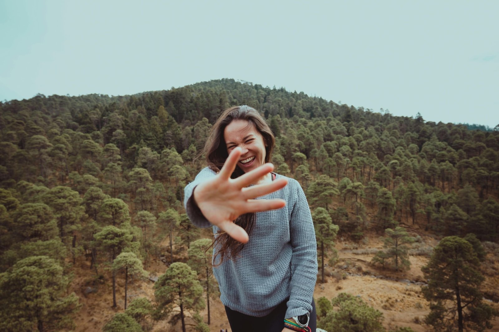 Happy traveler enjoying nature and exploring new destinations during a memorable trip