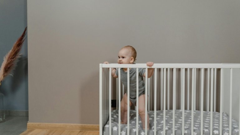 Lightweight portable baby travel crib set up outdoors showcasing comfort and safety for traveling families